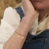 PULSERA ADAMYA LETRA CHAPA BAÑADA EN ORO